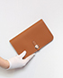 Hermes Dogon Wallet in Gold Togo, front view